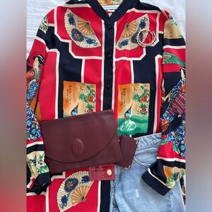 Vintage Cartier clutch and keys-cards holder made in a creamy leather